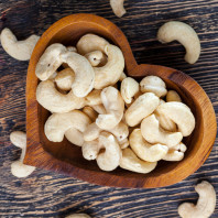 Crunchy cashews in a heart-shaped bowl
